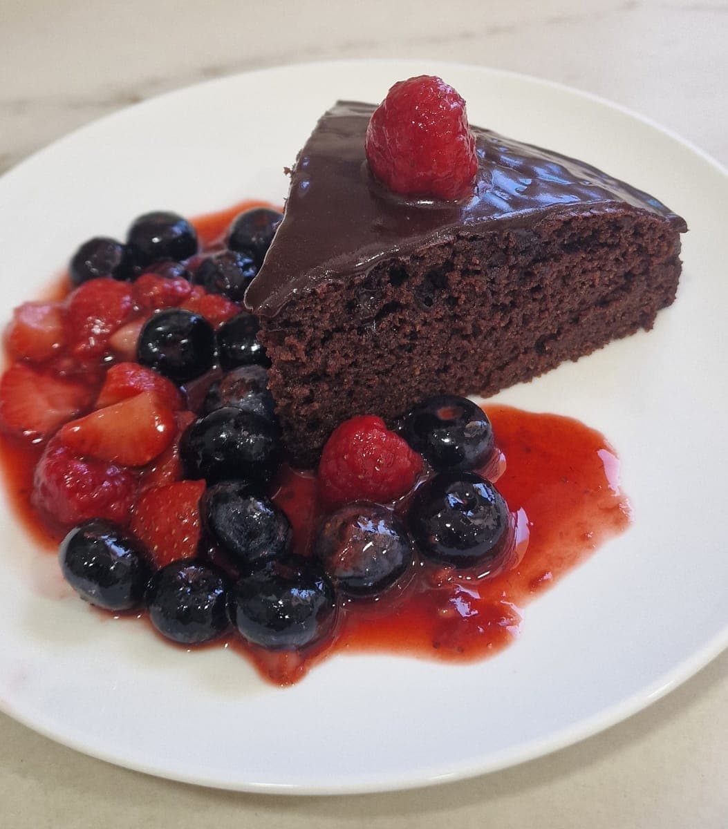 Chocolate cake with berry compote