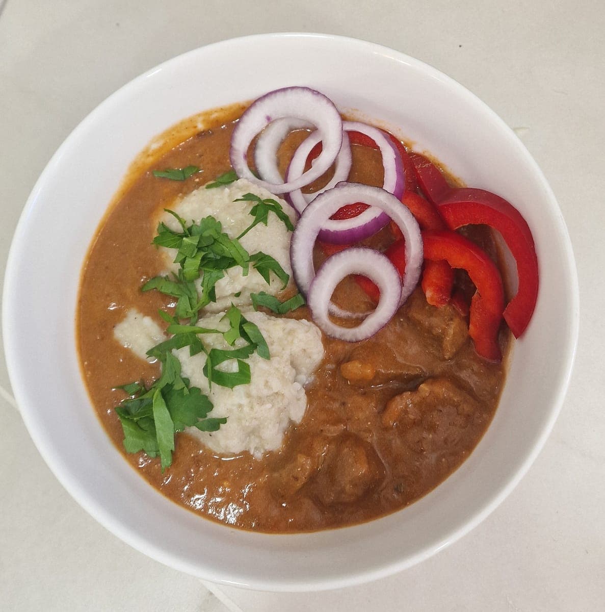 Czech-style beef stew with potato dumplings