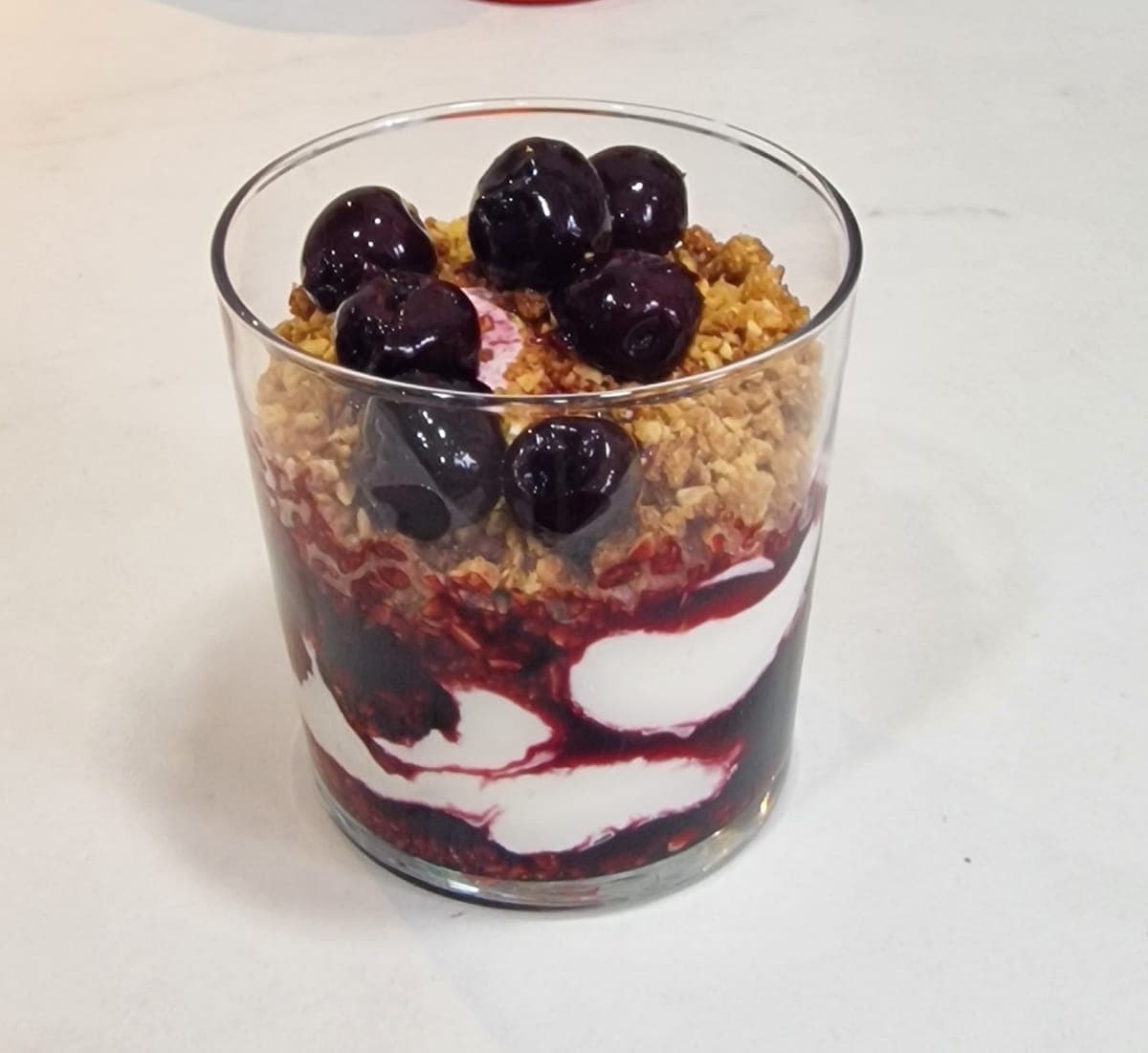Gluten-free sweet and salty crumble cheesecake with cherry compote