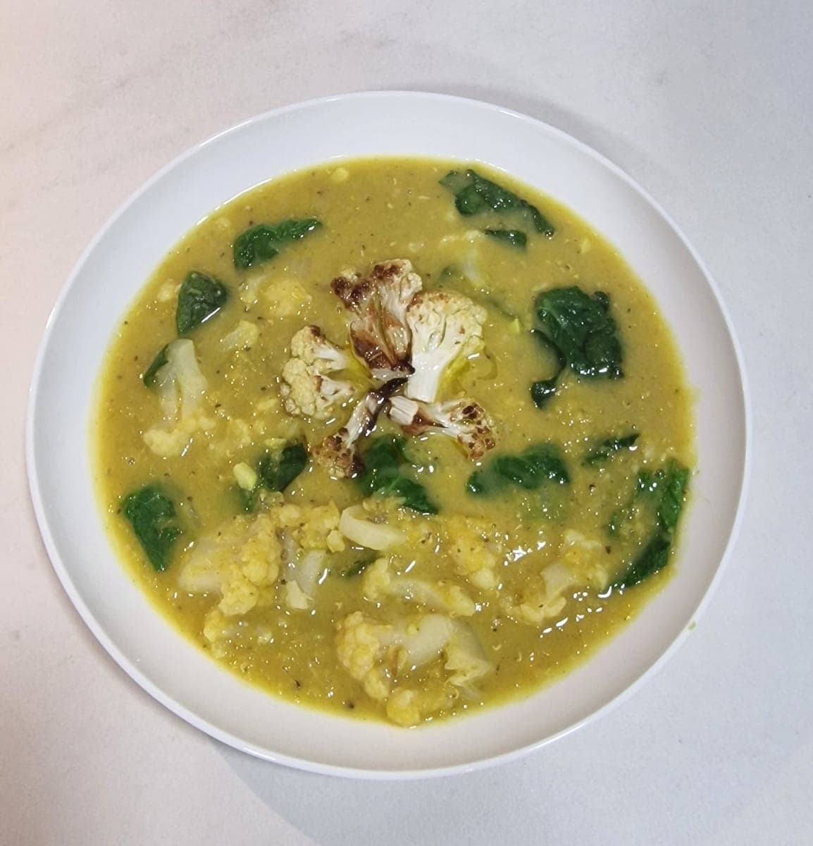 Lentil and cauliflower soup with spinach