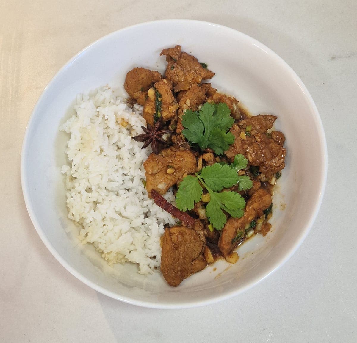 Peking-style pork and mandarin stir-fry with rice
