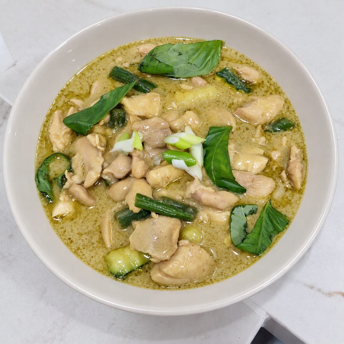 Thai chicken green curry, served with jasmine rice